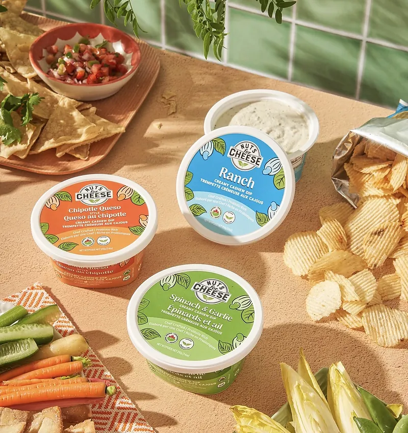 Nuts For Cheese Chipotle Queso, Ranch and Spinach and Garlic cashew dips with chips and vegetables
